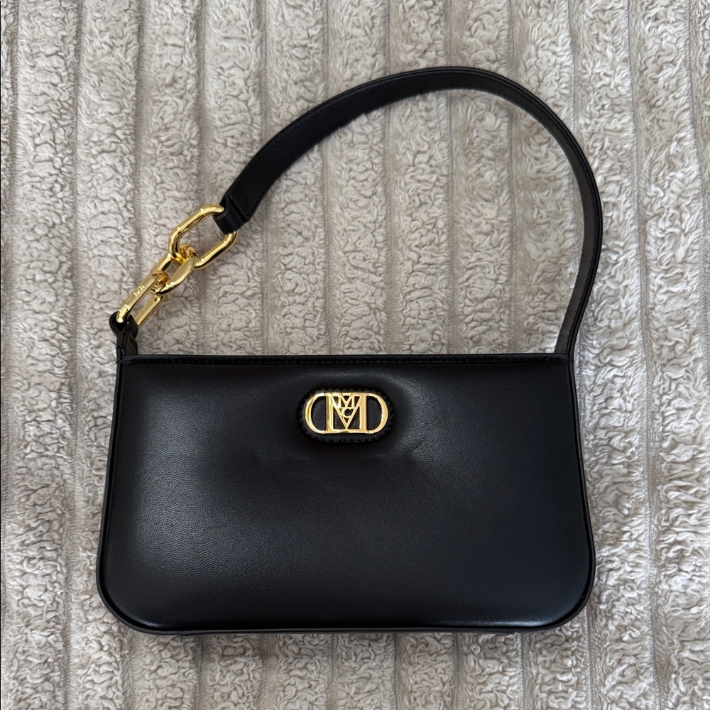 MCM Black Leather Shoulder Bag with Gold Hardware